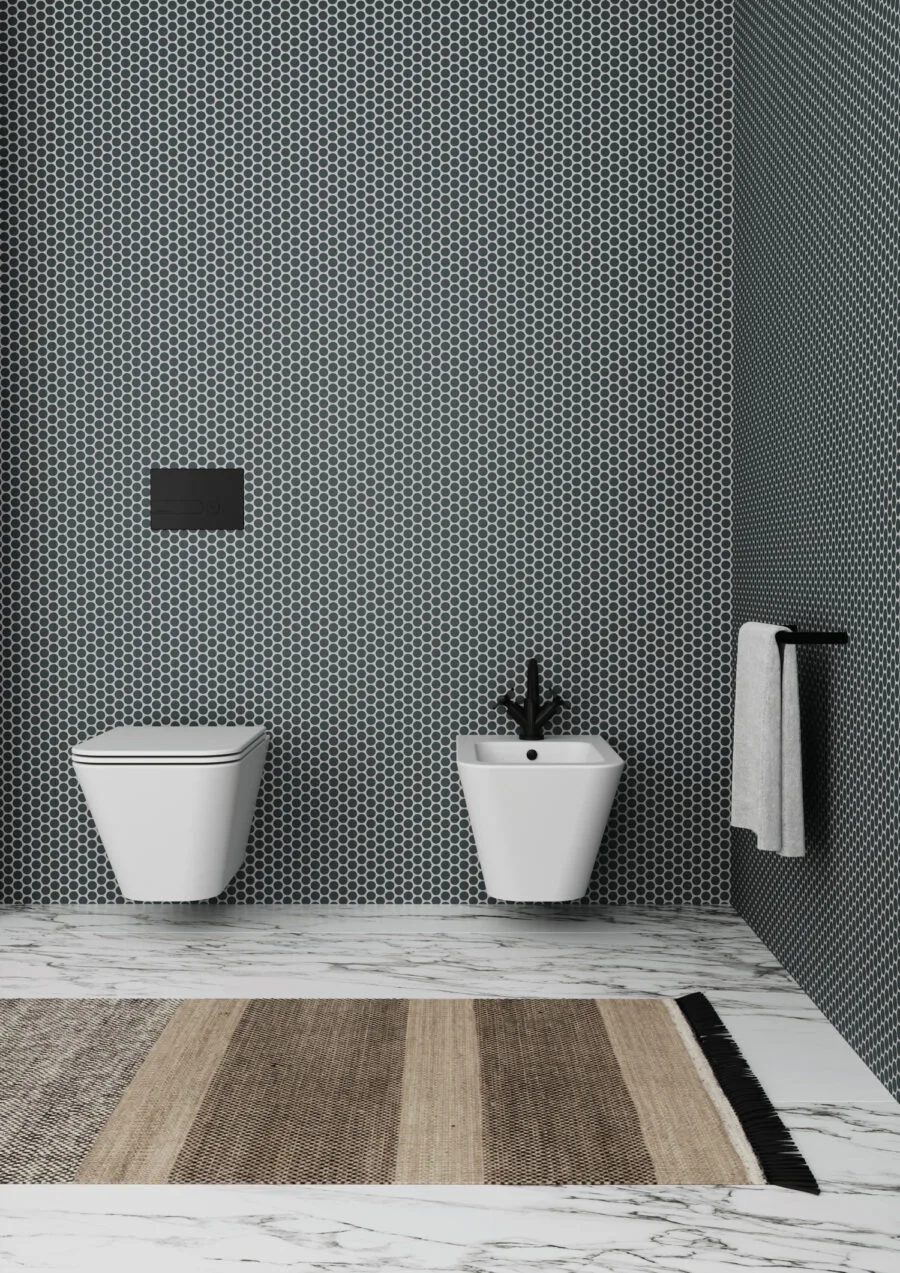 Azzurra Ceramica Build: wandhängendes WC und Bidet vor Mosaikwand