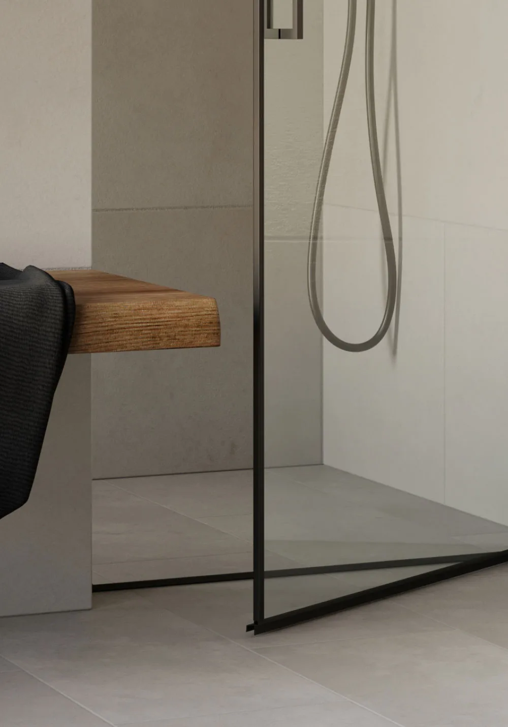 Vismaravetro Smack: Detail Glaswand mit schwarzem Profil und Handbrause