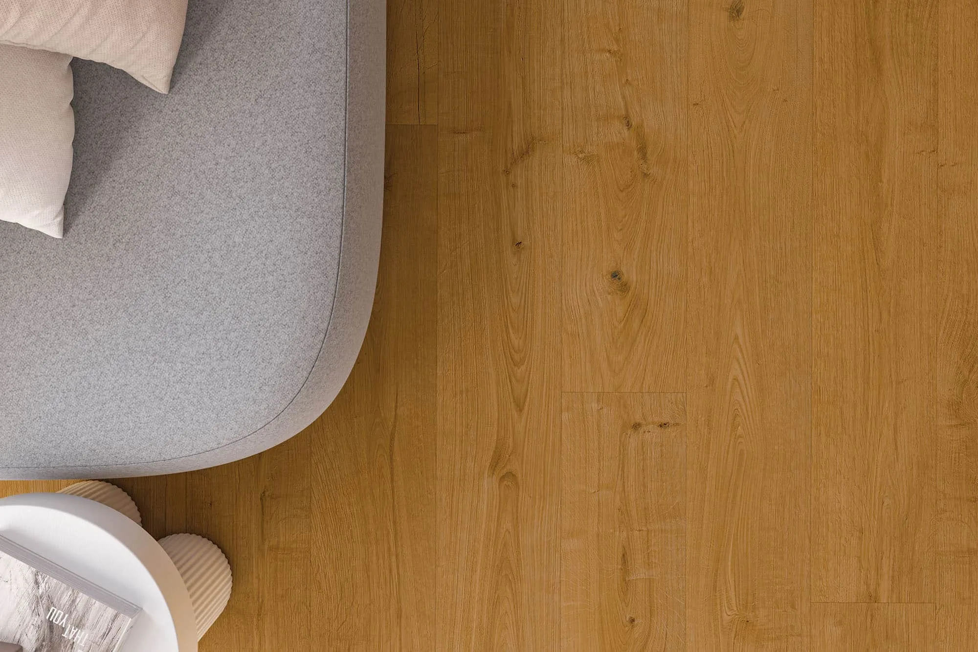 Déco Clap Zer0: Designboden in Eichenoptik neben einem Sessel, von oben